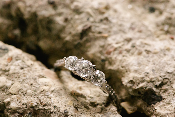 triple diamond engagement ring in natural stone