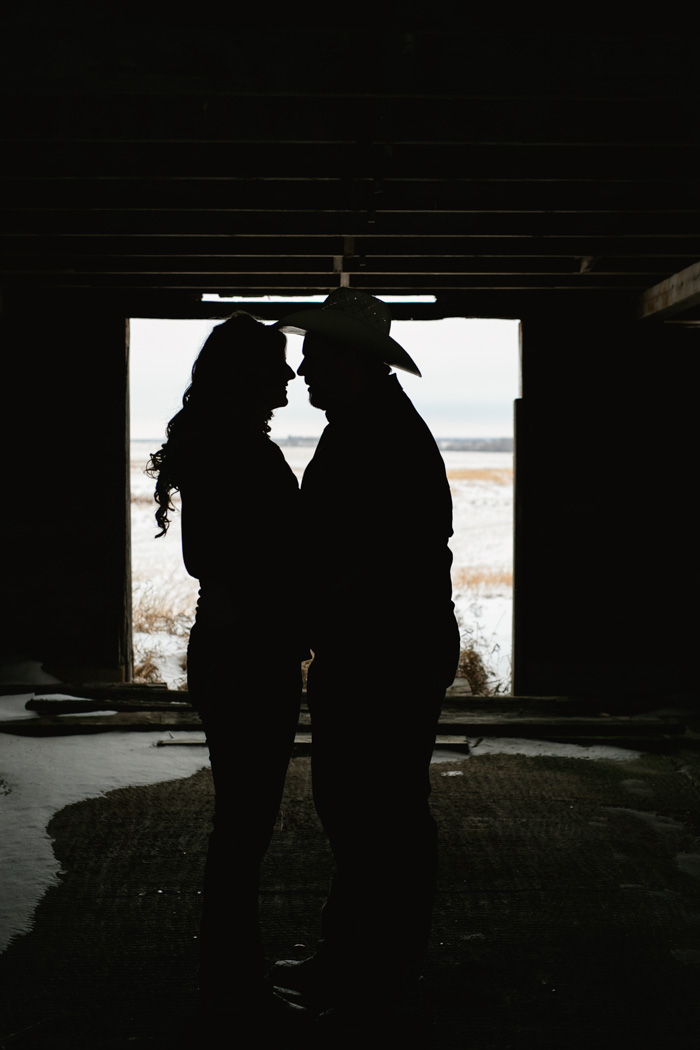 country silhouette photo in a rustic barn