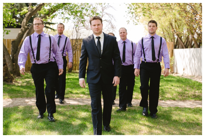 photo of groom and groomsmen walking like on the movie reservoir dogs