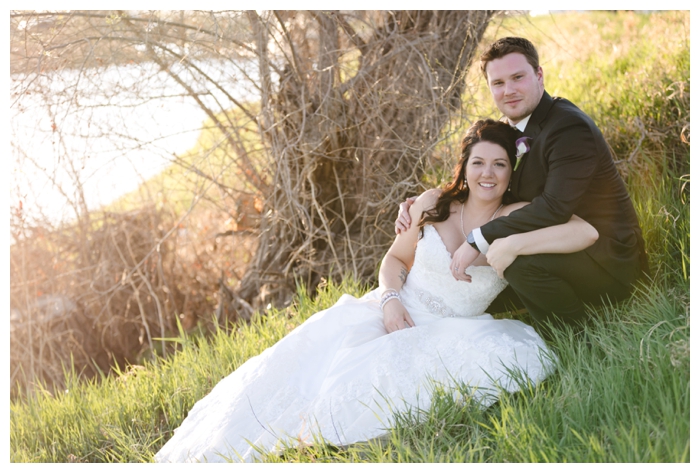 photo of wedding couple by Souris River in weyburn