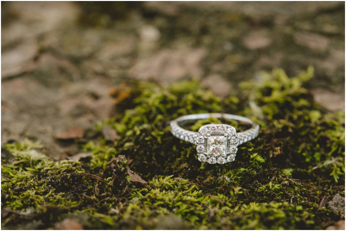photo of diamond ring in moss