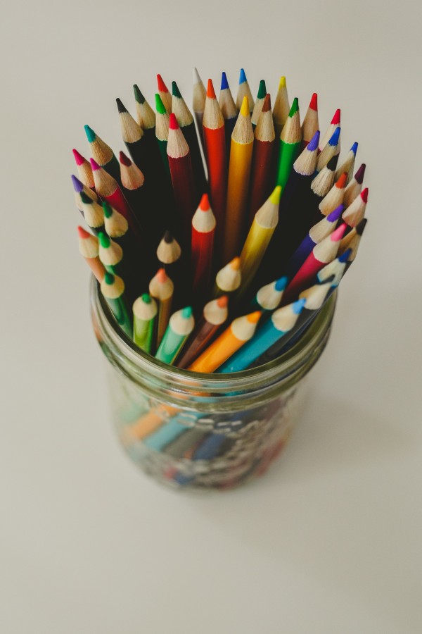 mason jar photo of pencil crayons photo