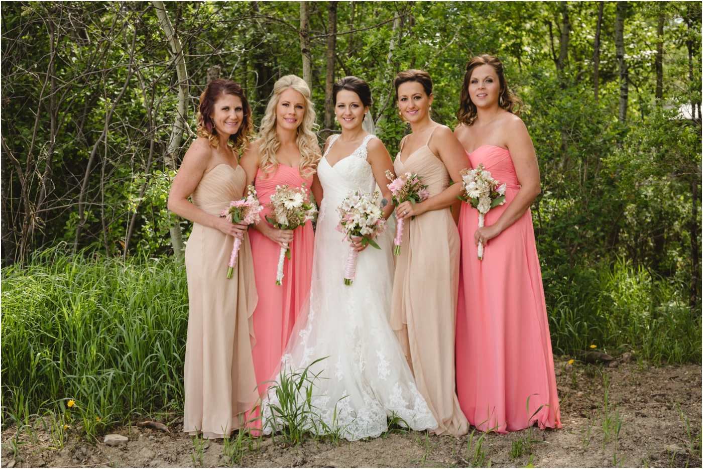 beautiful bridesmaids in coral spring colors