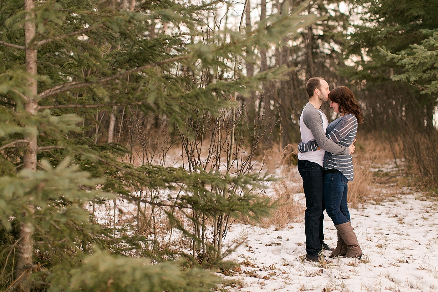 Casual Winter Engagement Photos at Kenosee Lake