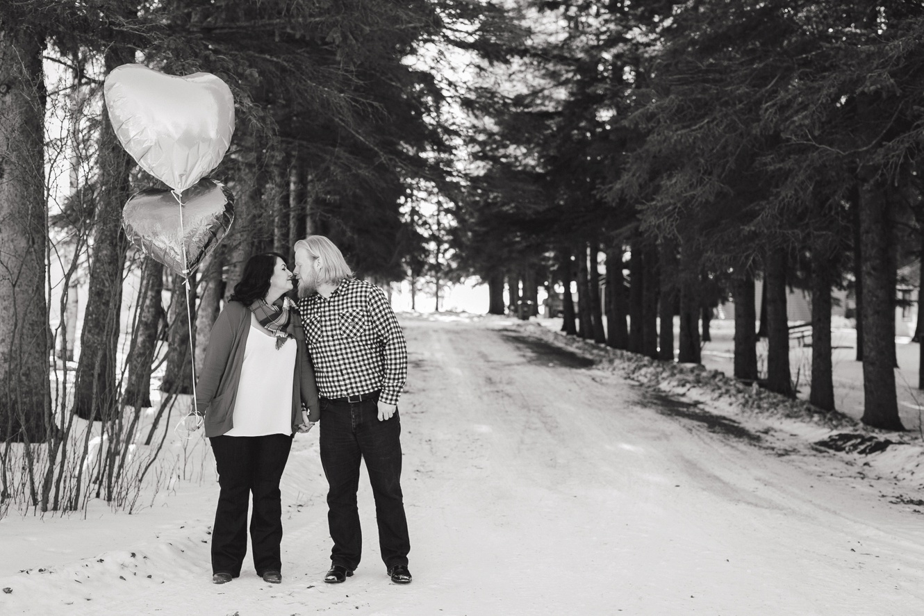 black and white photo of romantic engaged couple