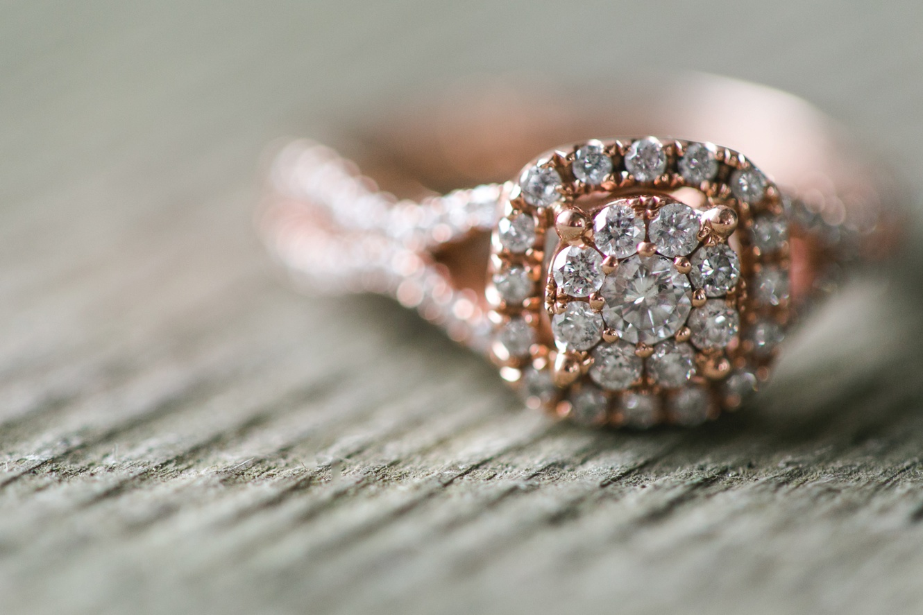 photo of rose gold diamond ring engagement session