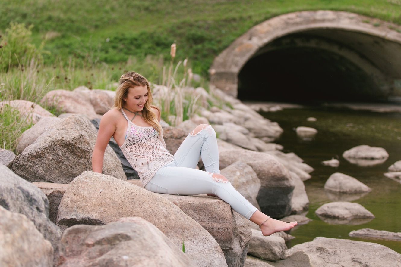 casual senior graduation session oxbow valley cement arch by the river