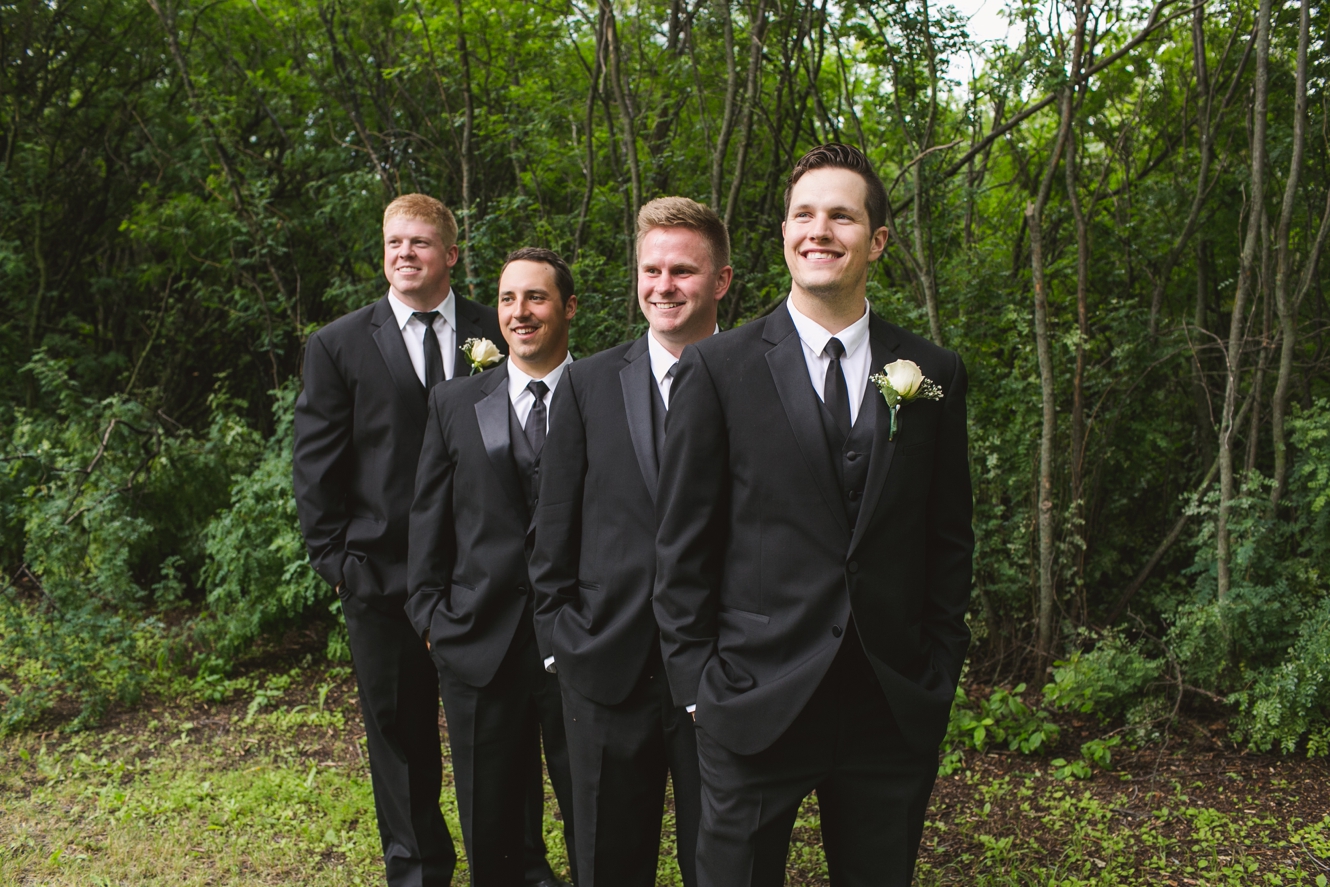 groomsmen dressed in black and white photo