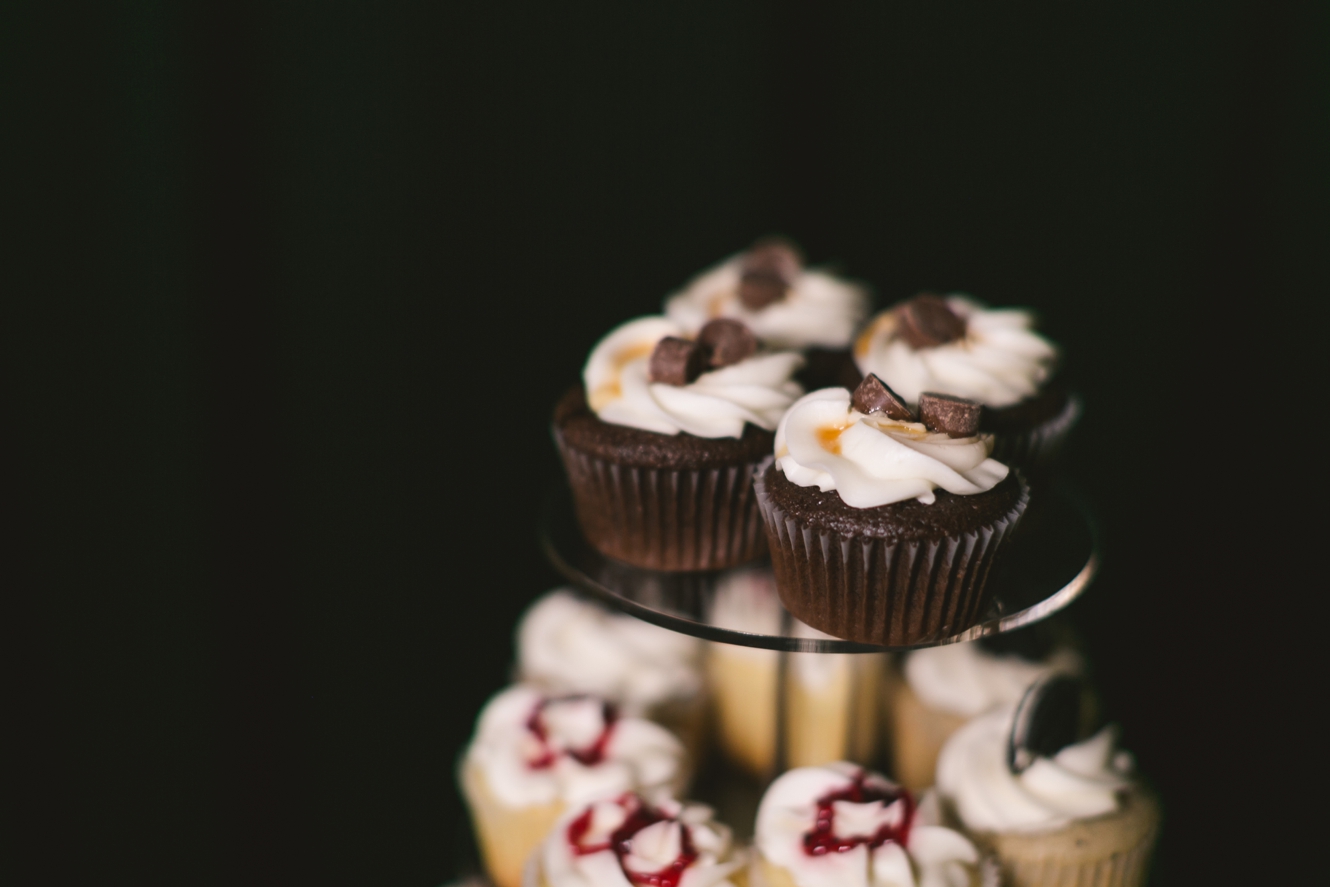 cupcakes topped with candy bar topping photo