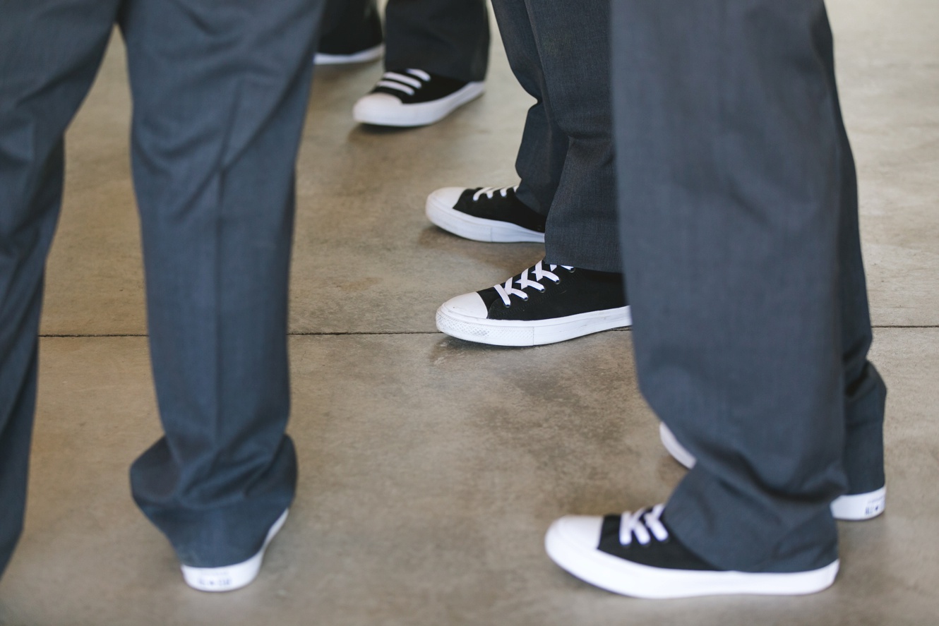 groomsmen wearing converse shoes photo