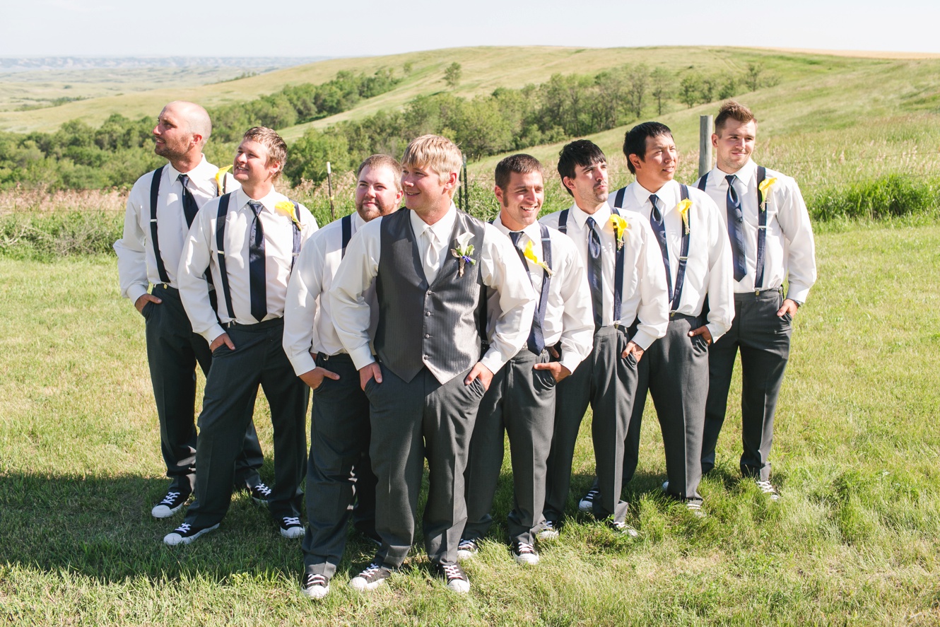 groomsmen wearing suspenders photo