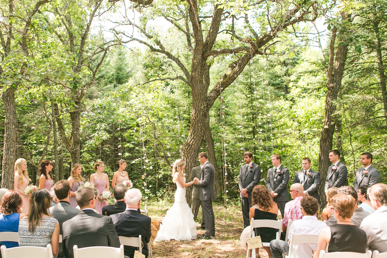 getting married under a tree in the woods photo