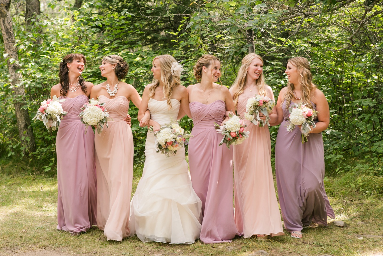 bridesmaids in blush pastel dresses photo