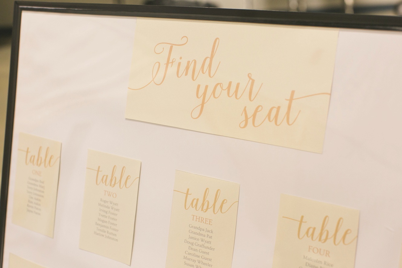 navy and gold wedding seating chart inspo photo
