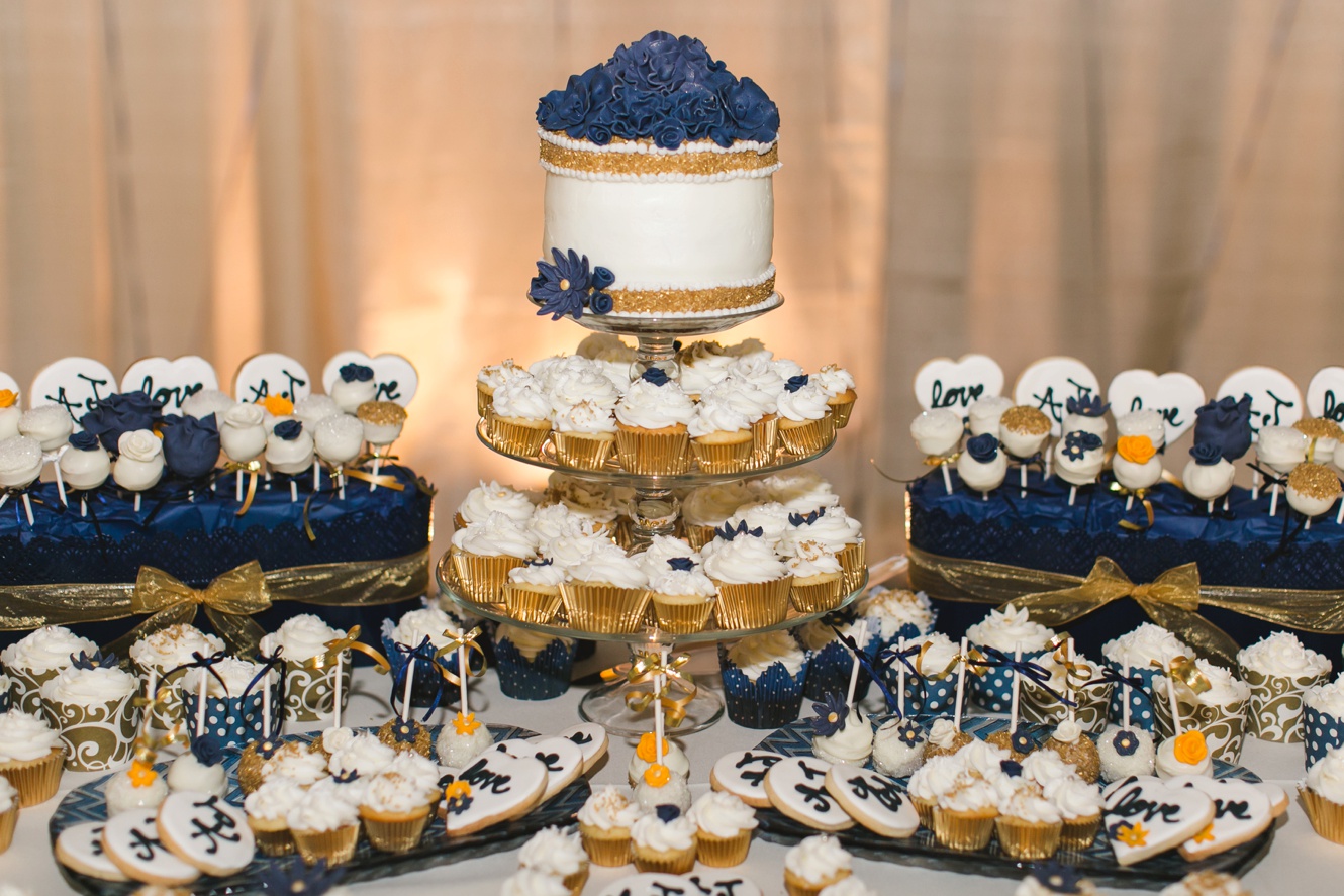 Navy and gold wedding cake photo