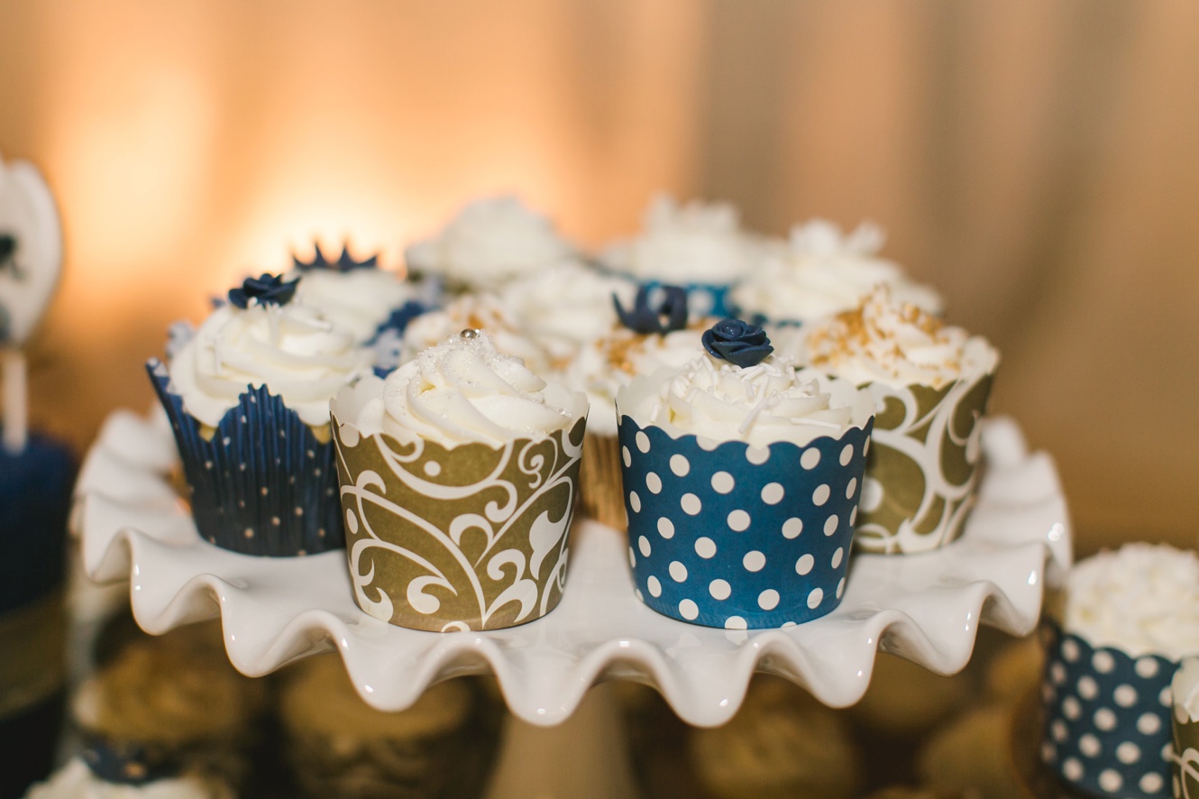 Gold and navy wedding cupcakes photo