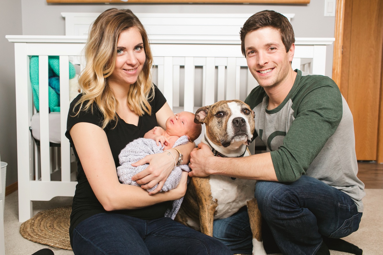 New family of four baby boy newborn session with dog photo
