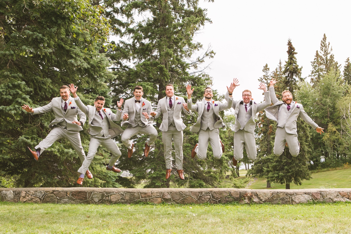 Groomsmen jumping photo