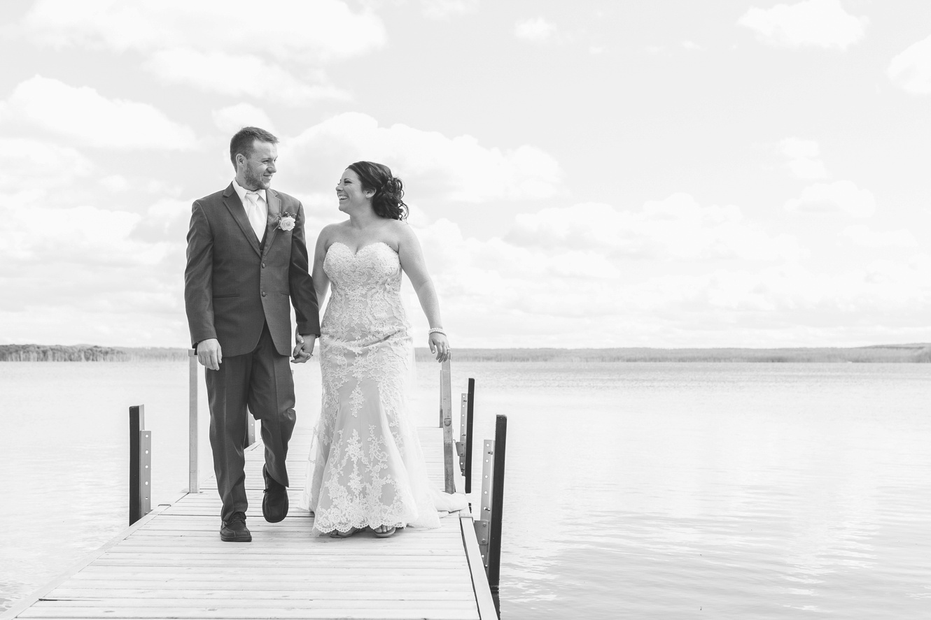 Rustic Summer Kenosee Lake Wedding photo on the dock