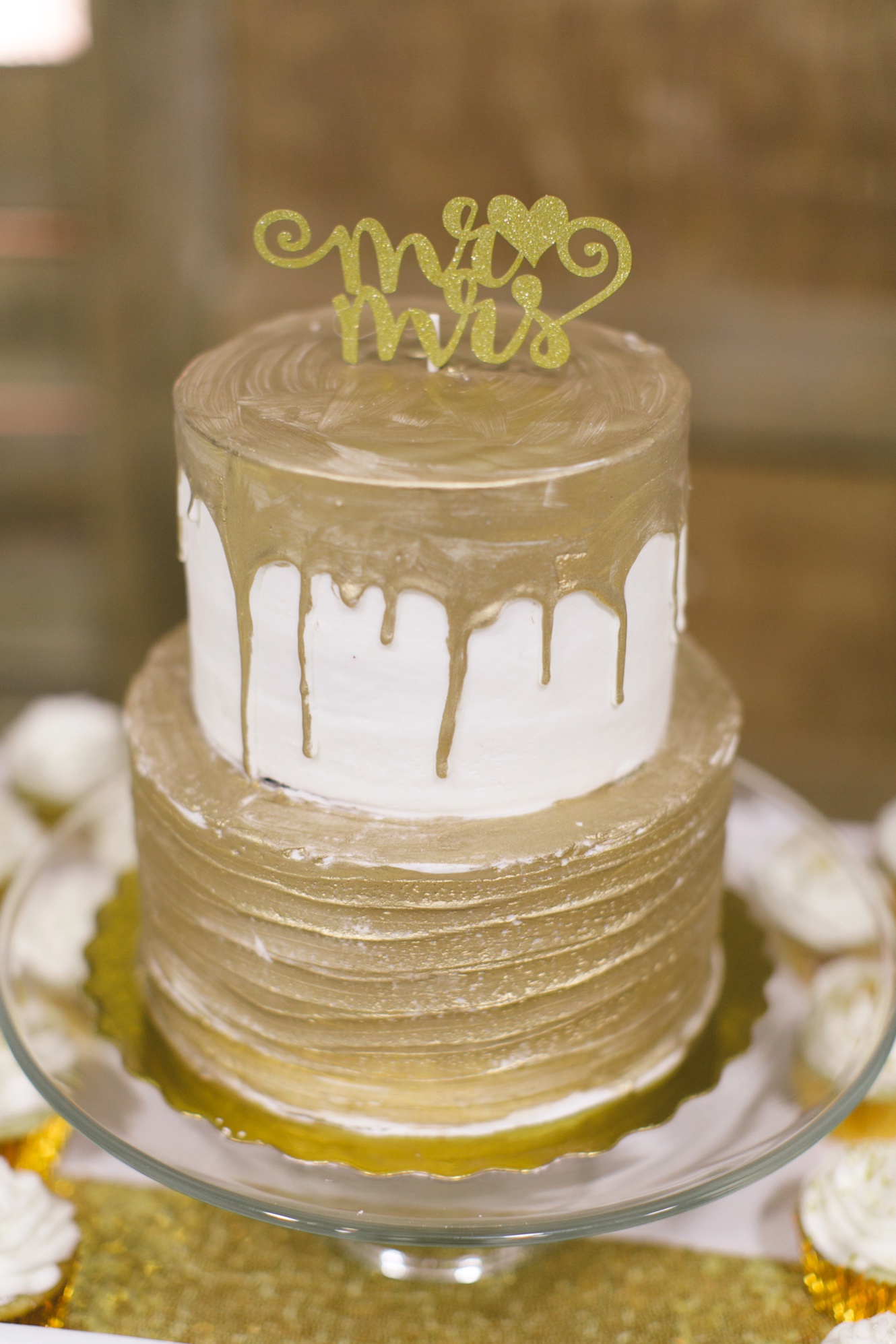 Gold and ivory wedding cake photo