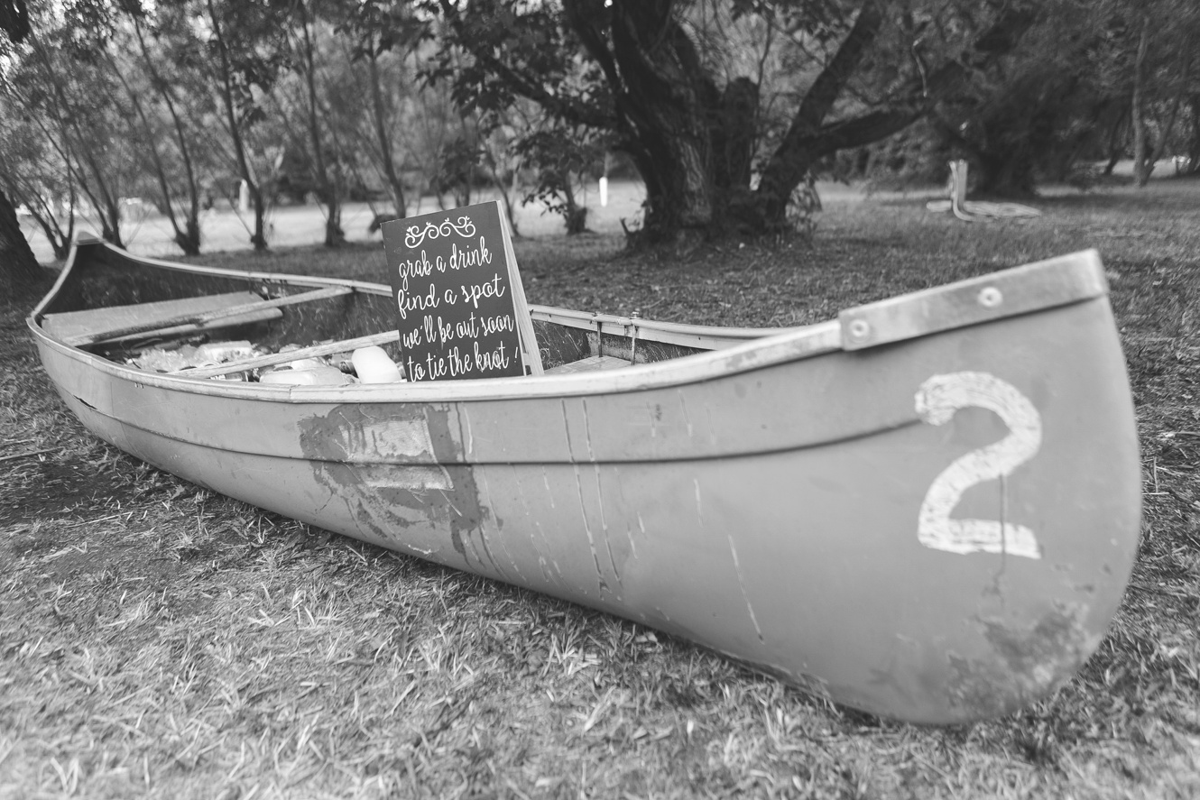 Canoe to hold beverages for wedding ceremony guests photo