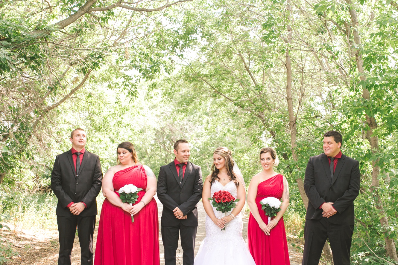 Cherry red and black wedding party photo
