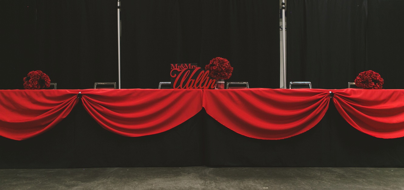Red and black wedding reception photo