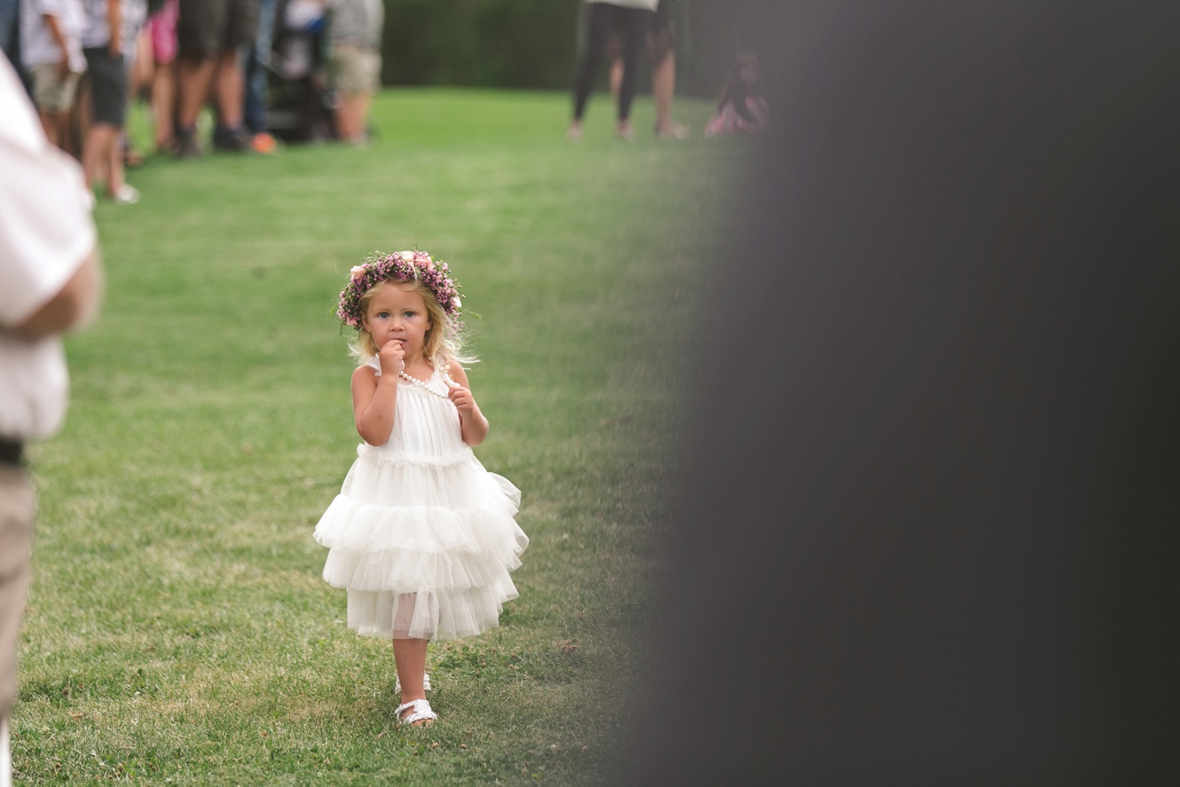 Adorable flower girl with flower crown photo