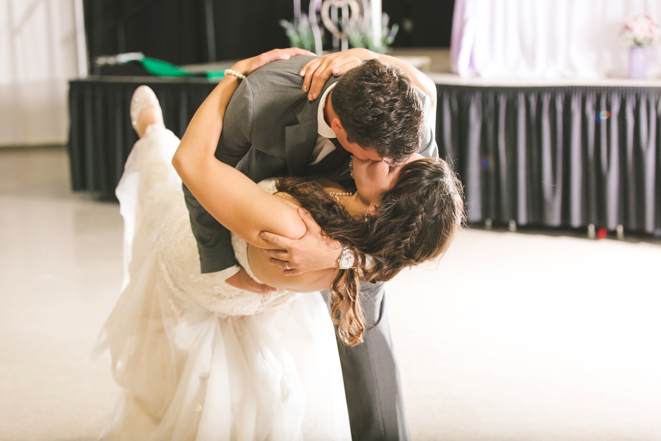 Dip kiss at wedding dance photo