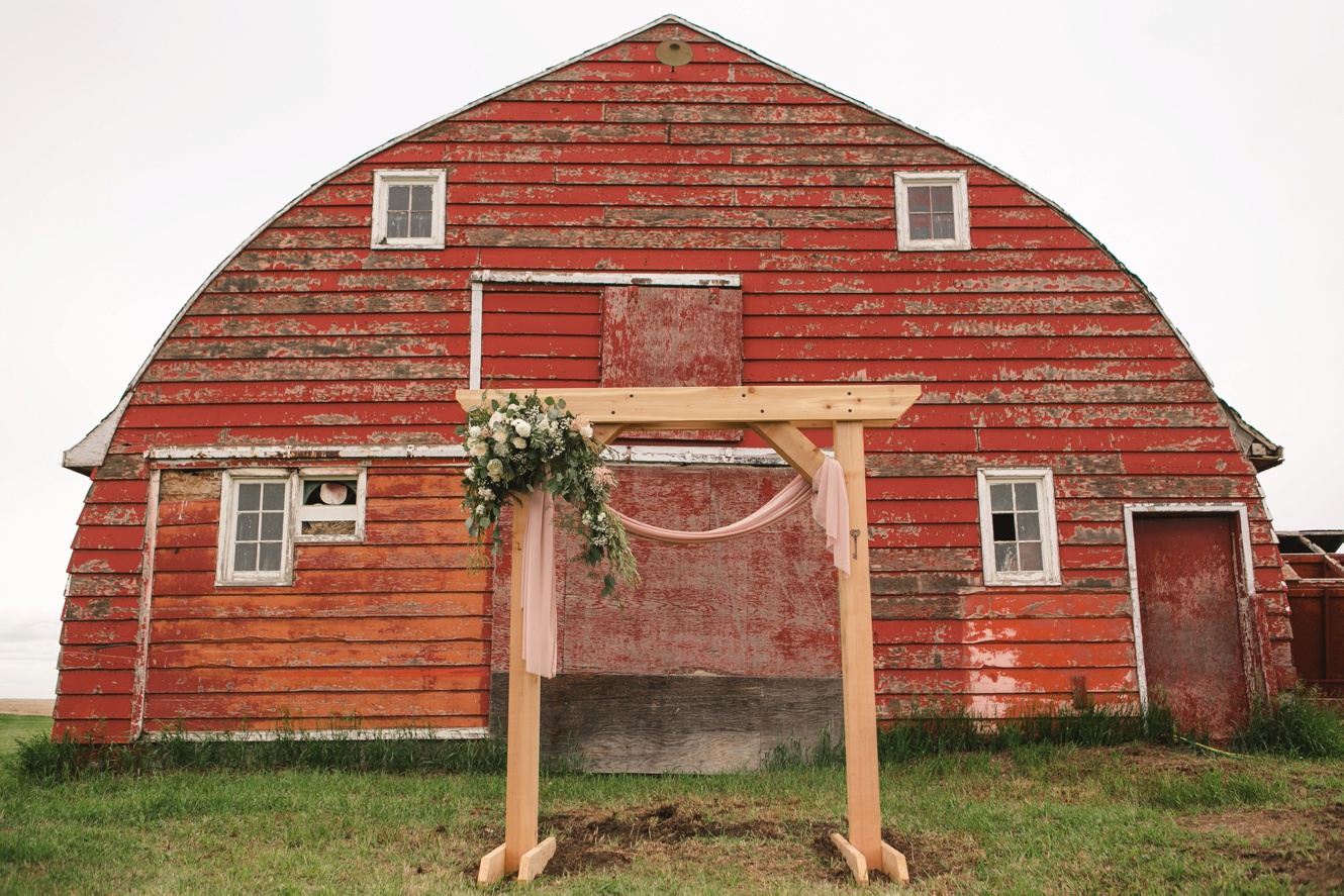 Red barn wedding ceremony photo