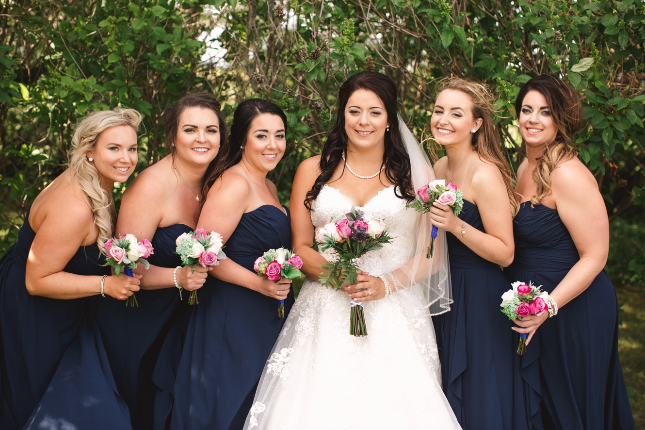 Navy bridesmaid gowns photo