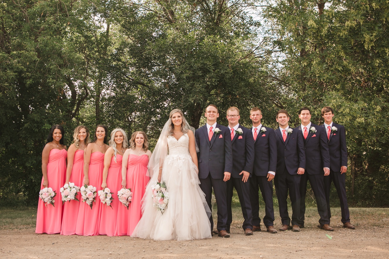 Navy and coral summer wedding photo