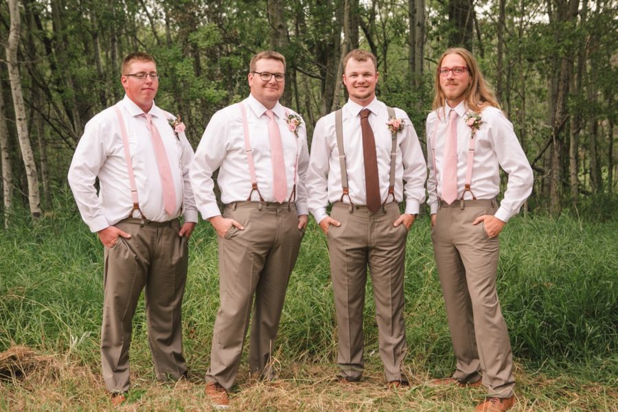 Suspenders and khakis wedding photo