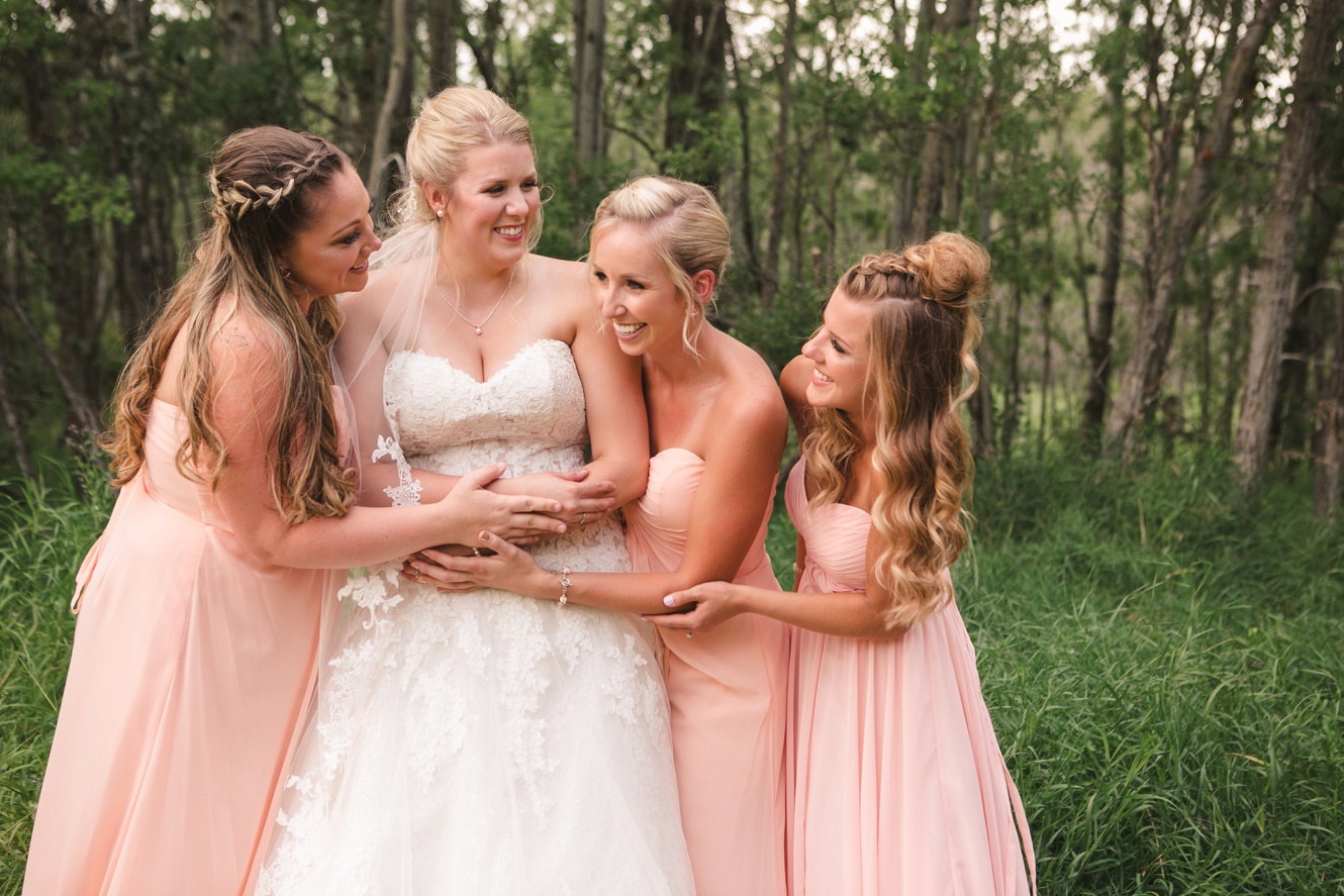 Bridesmaids laughing photo