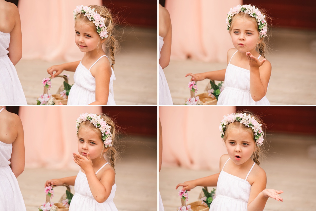 Flower girl blowing kisses photo