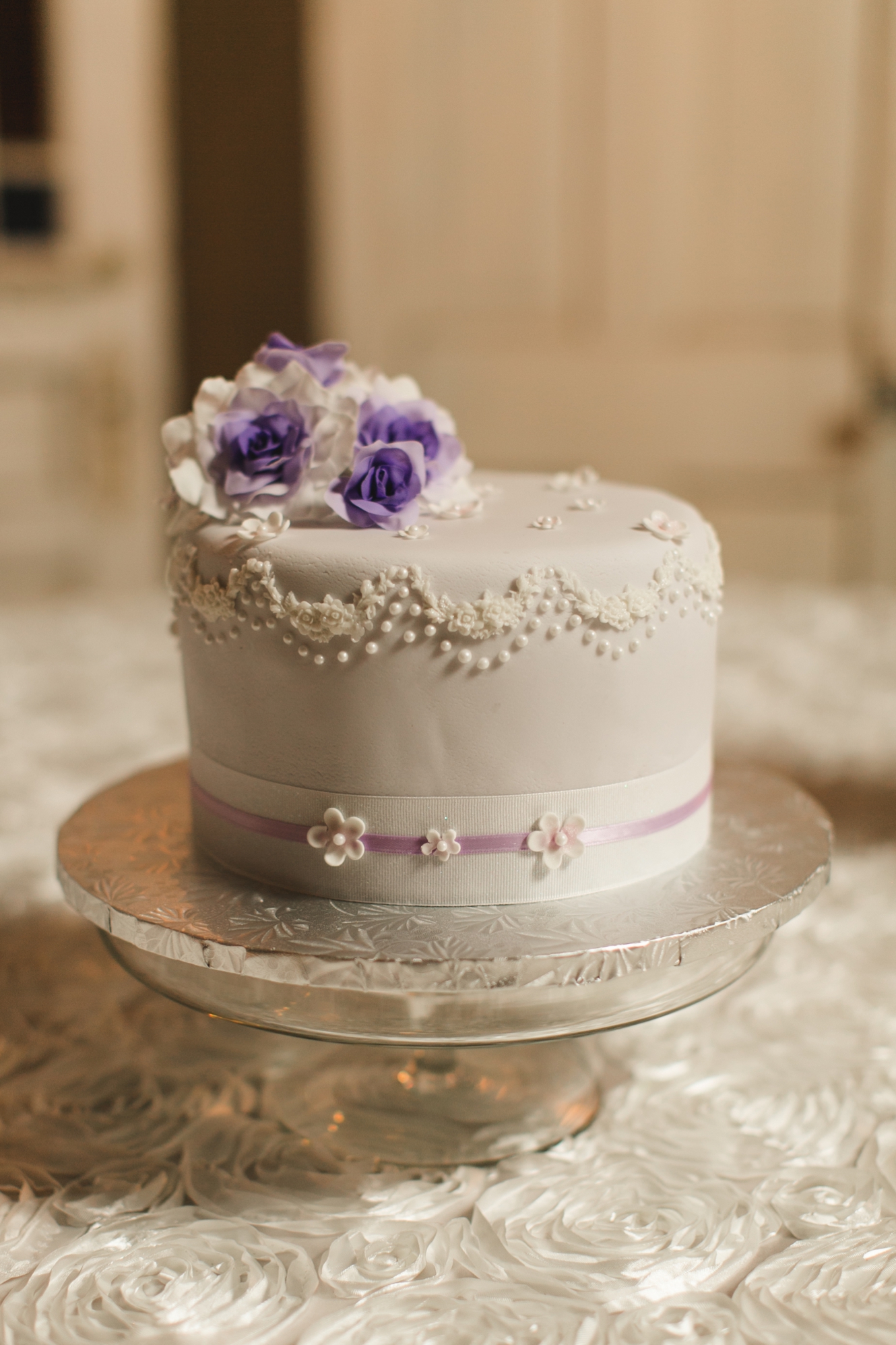 lavender and white wedding cake photo