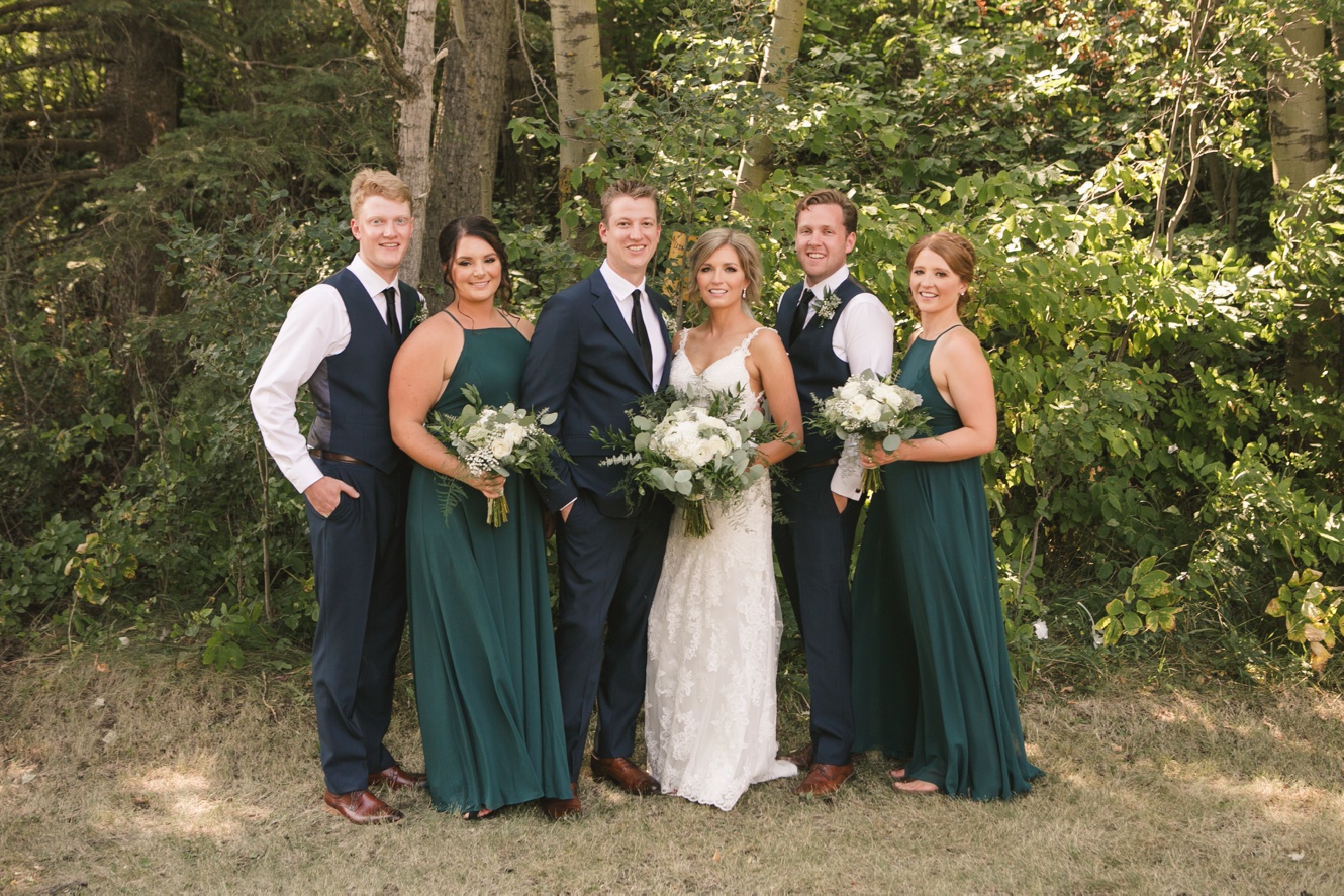 Navy and evergreen wedding photo