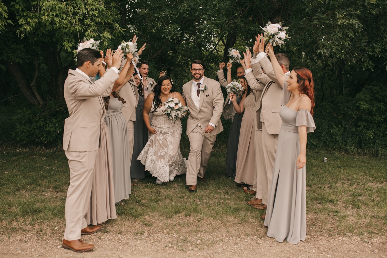 tunnel of love bridal party photo