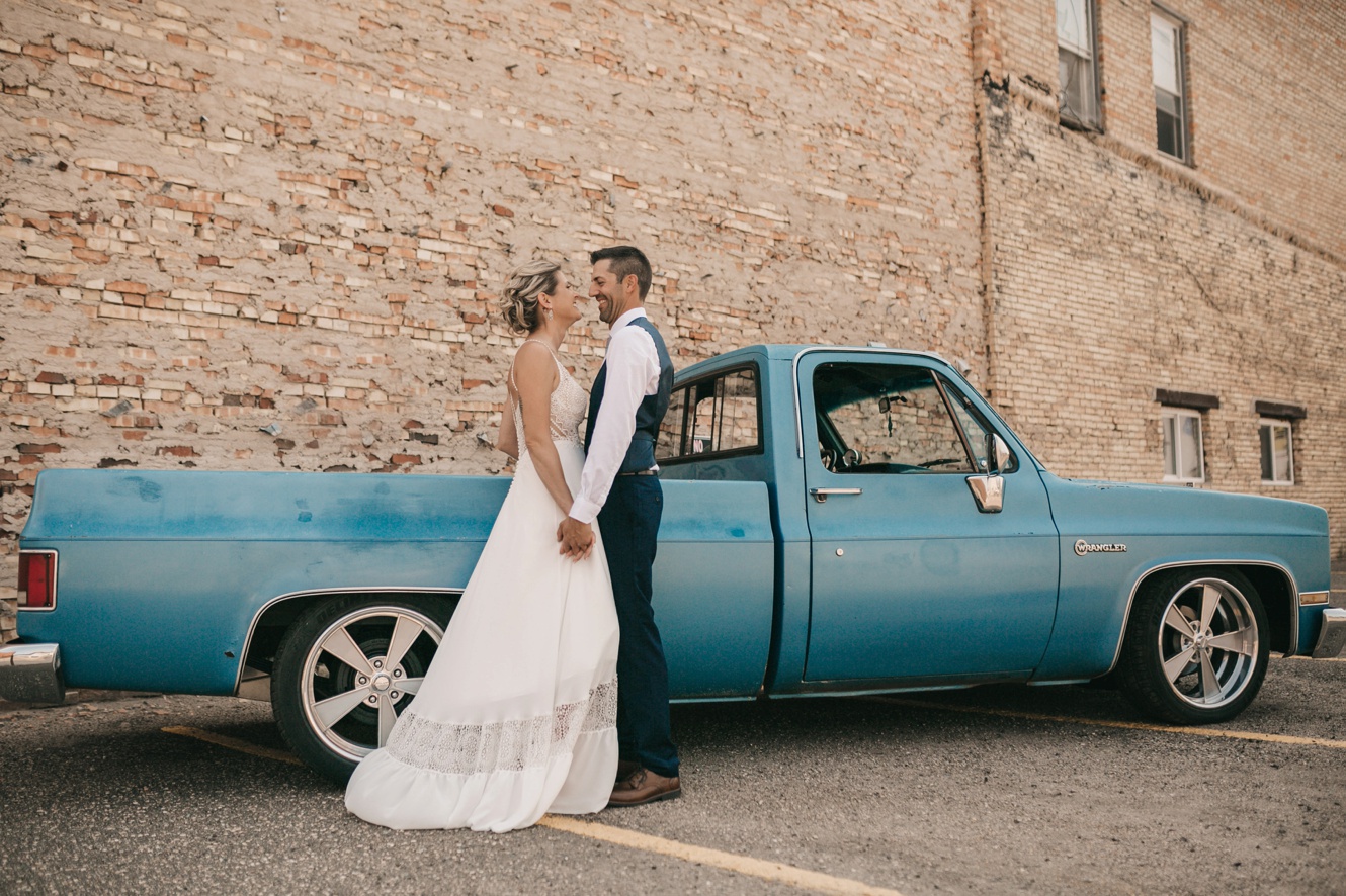 Vintage blue truck wedding photo