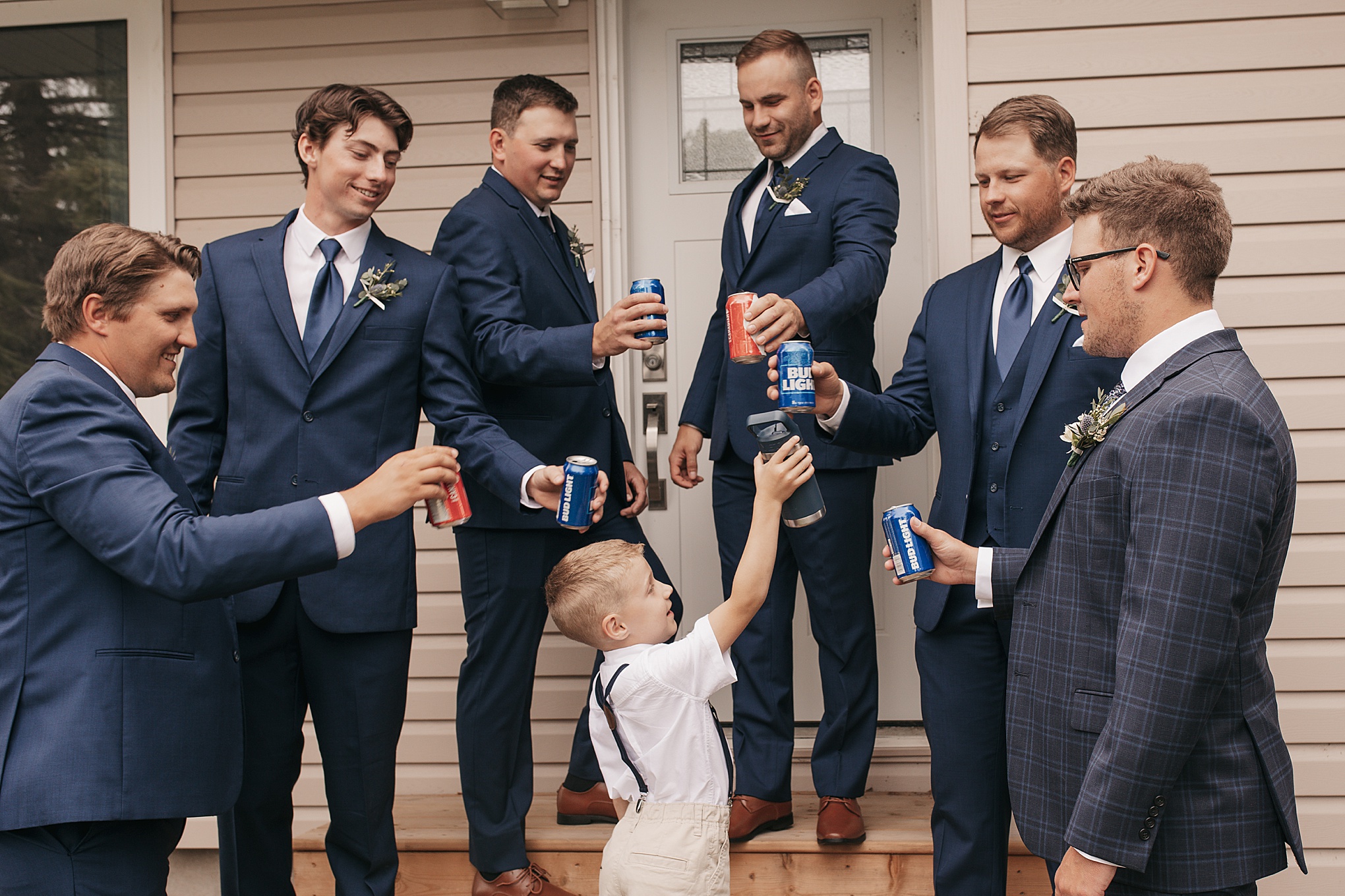 Groomsmen cheers wedding photo