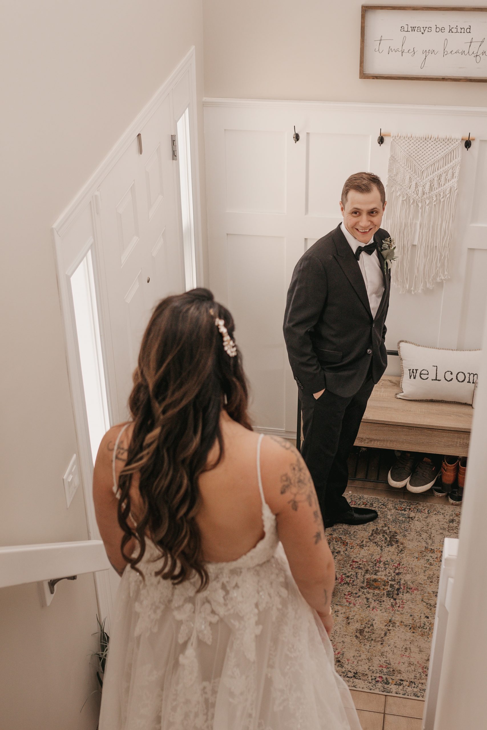 Intimate bride and groom first look photo
