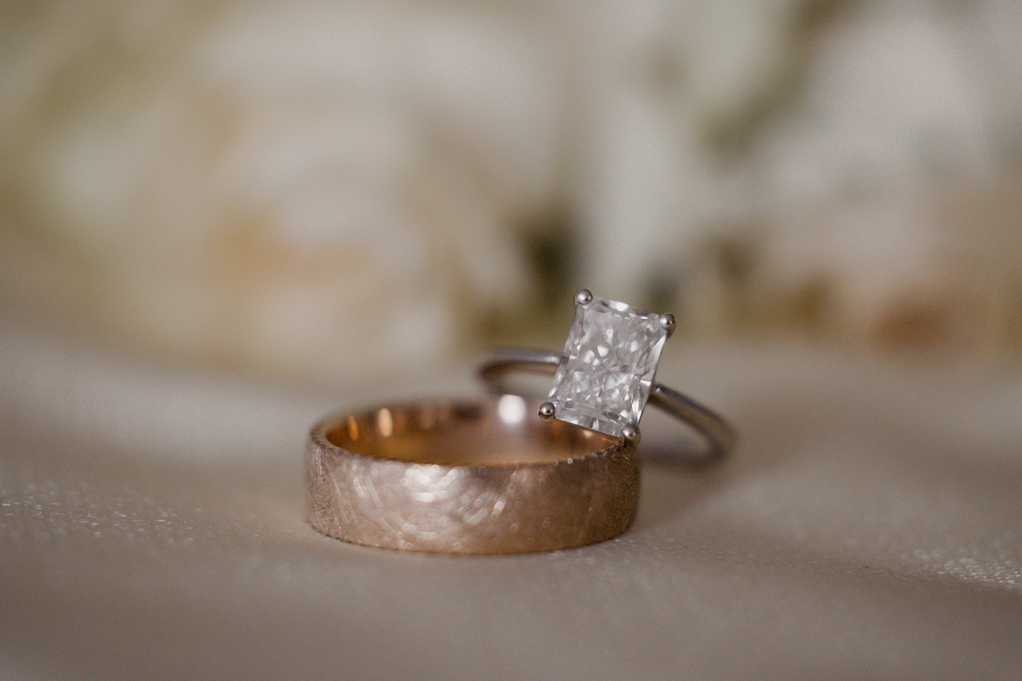 square cut diamond engagement ring with gold mens band